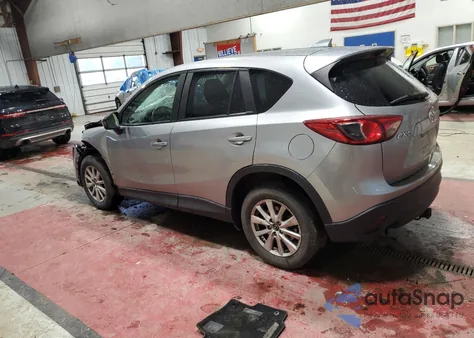 2013 Mazda Cx-5 Touring z USA, uszkodzony, nr VIN JM3KE2CE1D0122733